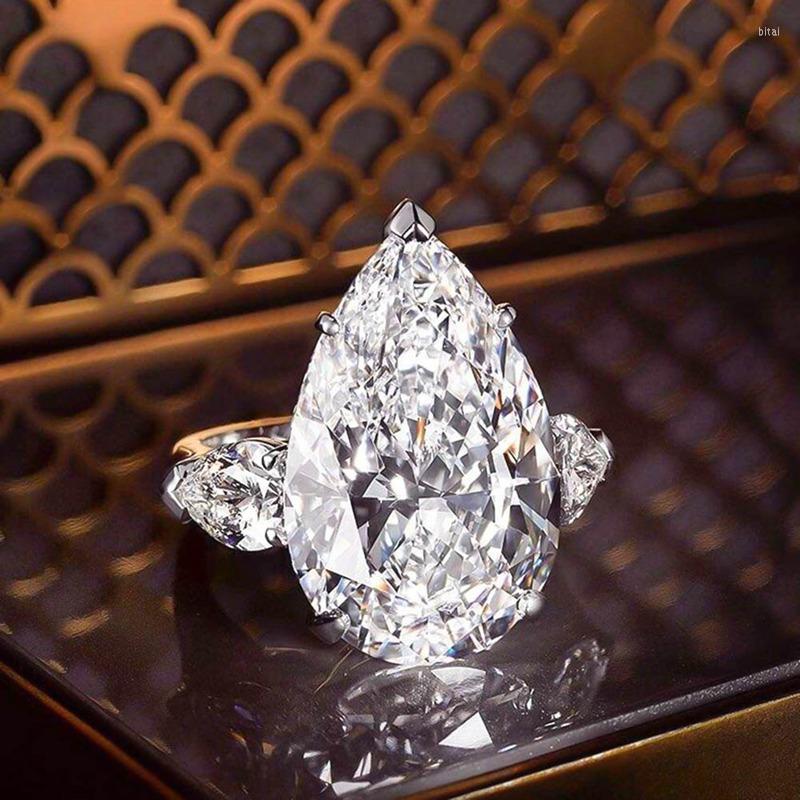 Wedding Rings Luxury Silver Color Inlaid Water Droplets Pear-Shaped Zircon Crystal Ring For Women Bride Gift Jewelry
Wedding Rings Luxury Silver Color Inlaid Water Droplets Pear-Shaped Zircon Crystal Ring For Women Bride Gift Jewelry