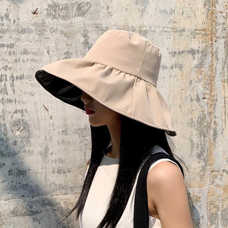 Berets Women Summer Wide Brim Sunscreen Hat With Rope Outdoor Beach Sun Protection Solid Foldable Caps Female Bucket Hats Anti-UV Cap, Black 
Berets Women Summer Wide Brim Sunscreen Hat With Rope Outdoor Beach Sun Protection Solid Foldable Caps Female Bucket Hats Anti-UV Cap, Black