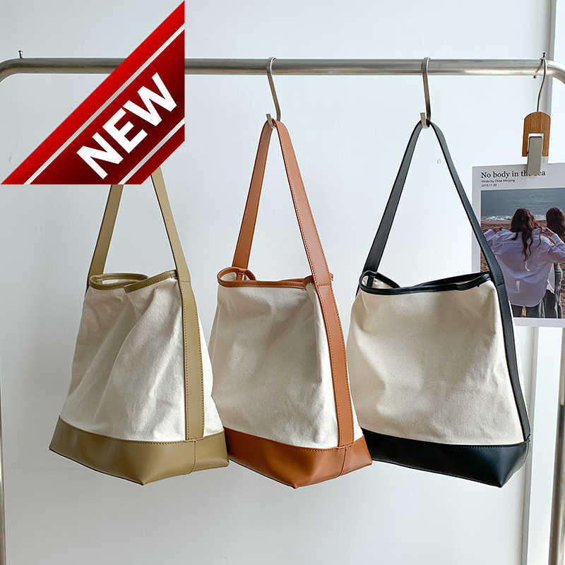 Designer Bags for Women New Arc De Triomphe Tote Large Capacity Women's Canvas Ins Style Niche Splicing Shoulder bag Fashion Factory Direct Sales, Black5
Designer Bags for Women New Arc De Triomphe Tote Large Capacity Women's Canvas Ins Style Niche Splicing Shoulder bag Fashion Factory Direct Sales, Black5