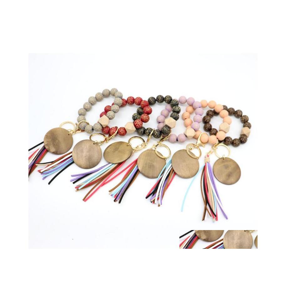 Keychains Lanyards Fashion Wooden Beads Bracelet Craft Carved Keychain Blank Disc Tassel Keyring Pendant Mticolor Bag Decorative K Dhpo1
Keychains Lanyards Fashion Wooden Beads Bracelet Craft Carved Keychain Blank Disc Tassel Keyring Pendant Mticolor Bag Decorative K Dhpo1