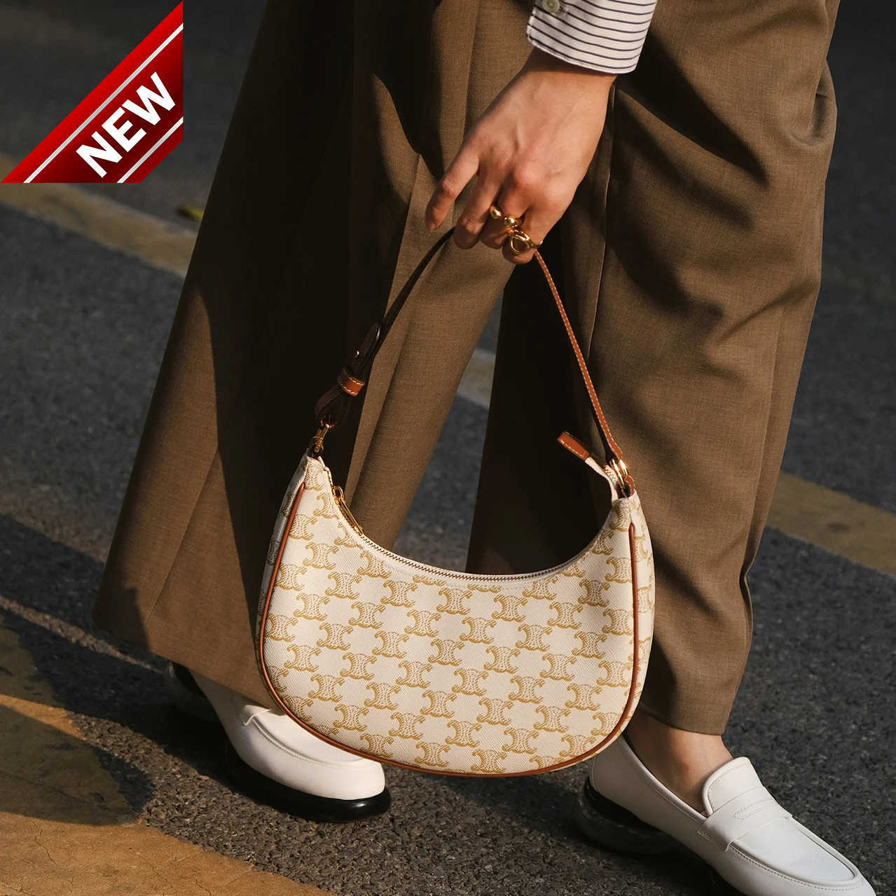 Women's Designer Bags New Arc De Triomphe Armpit Ava Single Shoulder Crescent Lisa Same Printed Stick Hand Women Factory Direct Sales, Reading
Women's Designer Bags New Arc De Triomphe Armpit Ava Single Shoulder Crescent Lisa Same Printed Stick Hand Women Factory Direct Sales, Reading