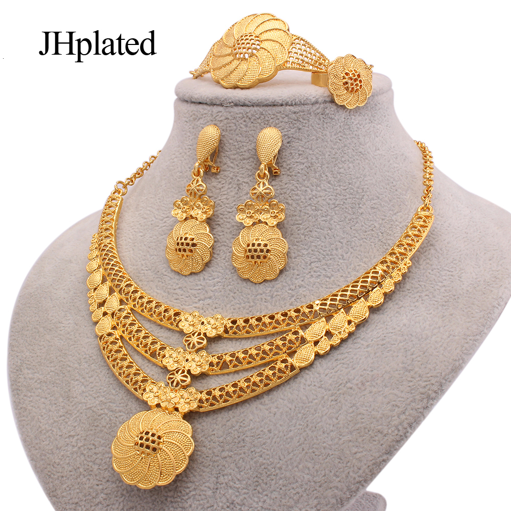 Wedding Jewelry Sets Hawaiian Gold plated wedding Flowers earrings bracelets bridal jewelry sets gifts Necklace ring jewellery set for women 221207
Wedding Jewelry Sets Hawaiian Gold plated wedding Flowers earrings bracelets bridal jewelry sets gifts Necklace ring jewellery set for women 221207