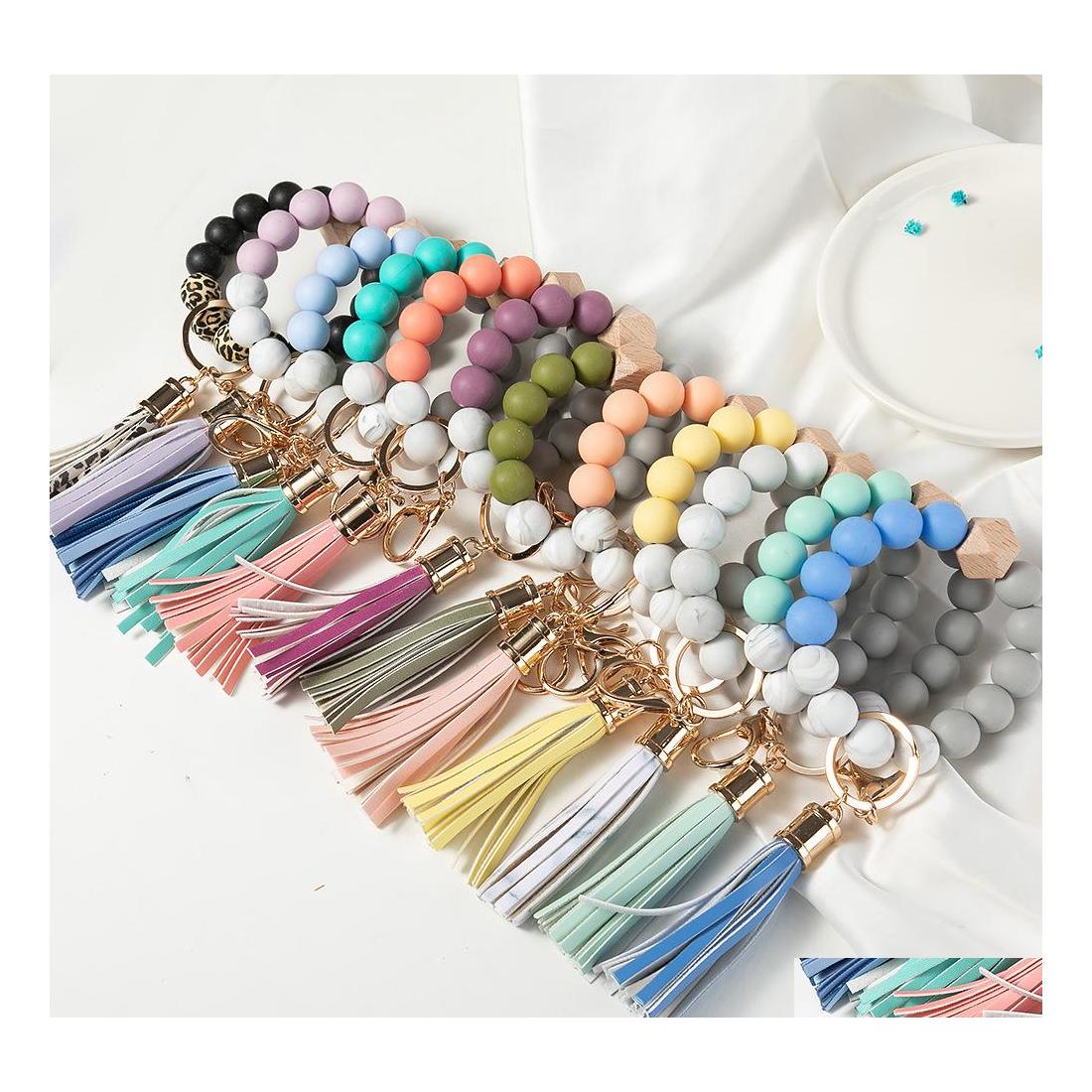 Keychains Lanyards Wooden Tassel Bead String Bracelet Keychain Food Grade Sile Beads Bracelets Women Girl Key Ring Wrist Strap Dro Dhdgc
Keychains Lanyards Wooden Tassel Bead String Bracelet Keychain Food Grade Sile Beads Bracelets Women Girl Key Ring Wrist Strap Dro Dhdgc
