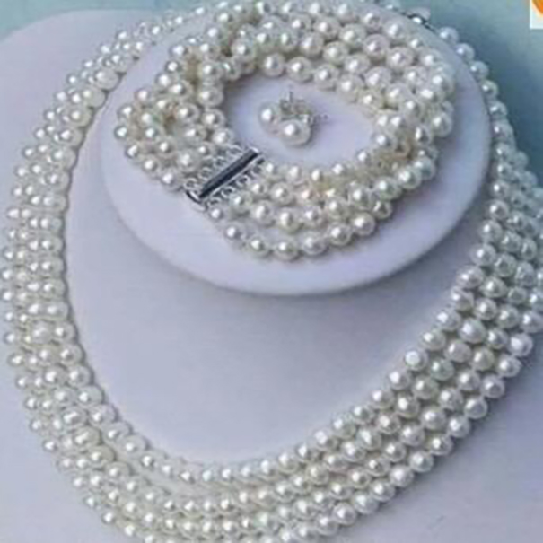 Beautiful Woman's jewelry 4rows white 6-7MM pearl necklace bracelet SETS set 17-19"
Beautiful Woman's jewelry 4rows white 6-7MM pearl necklace bracelet SETS set 17-19"