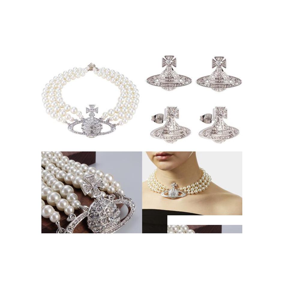 Bracelet Necklace Luxurious Western Queen Threetiered White Pearl Bracelets Fl Diamond Retro Planet Pendant Punk Style Designer Je Dhezp
Bracelet Necklace Luxurious Western Queen Threetiered White Pearl Bracelets Fl Diamond Retro Planet Pendant Punk Style Designer Je Dhezp