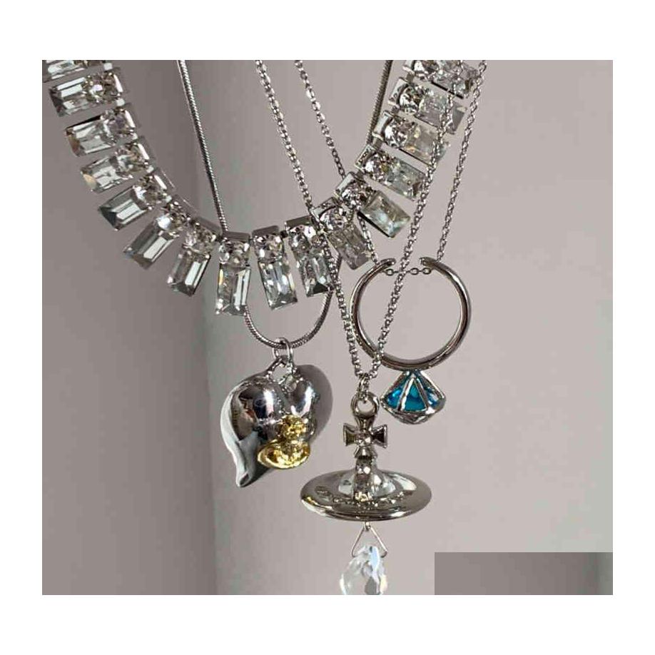 Strands Strings Vivi Designer Necklace Bracelet Earrings Trendy Brand Vw Pendant Diamond Chain Punk Hip Hop Accessories Vintage Gol Dht3K
Strands Strings Vivi Designer Necklace Bracelet Earrings Trendy Brand Vw Pendant Diamond Chain Punk Hip Hop Accessories Vintage Gol Dht3K