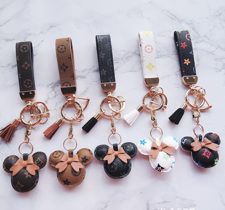 Mouse Design Car Keychain Favor Flower Bag Pendant Jewelry Tassel Keyring Holder for Men Gift Fashion PU Leather Animal Key Chain Accessories
Mouse Design Car Keychain Favor Flower Bag Pendant Jewelry Tassel Keyring Holder for Men Gift Fashion PU Leather Animal Key Chain Accessories