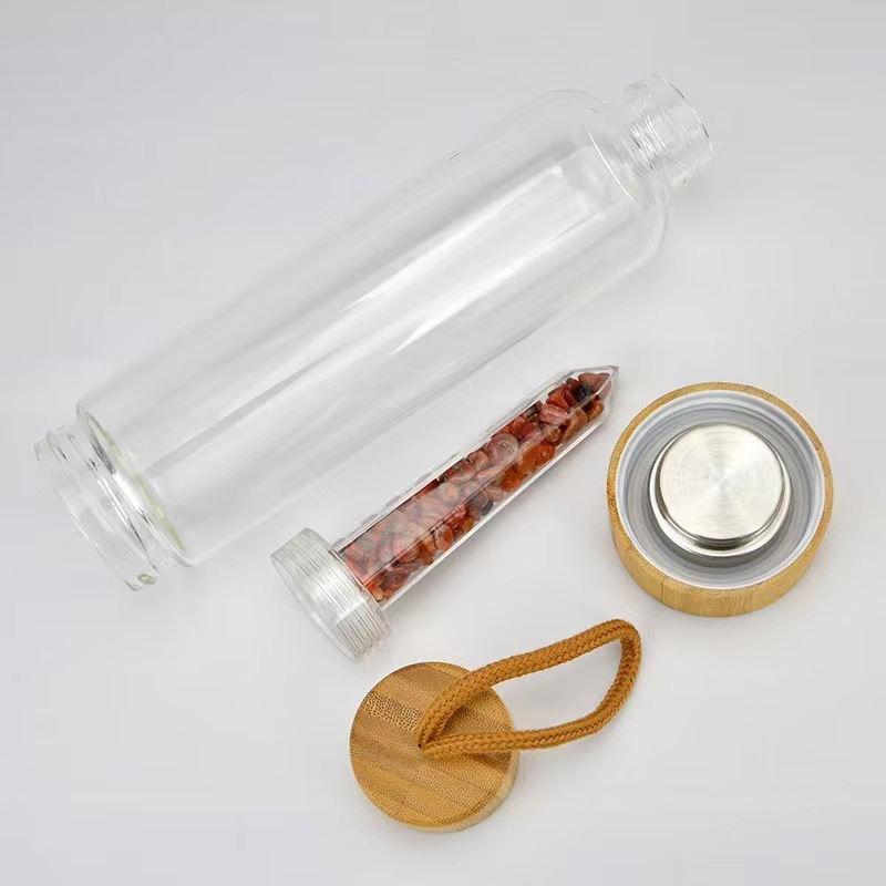 Natural crystal crushed stone energy glass water bottle healing quartz bottles Bamboo covered with rope health cup