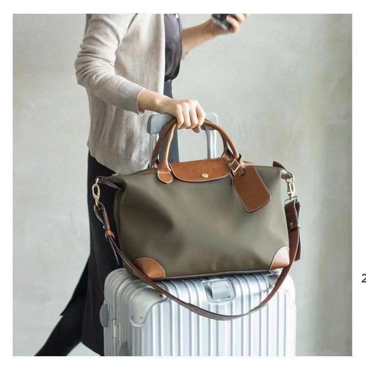 Duffel Bags Women bag men Highest quality Le Pliages Club 70 anniversary champion Luxurys Designers LONG duffel with shoulder straps A3
Duffel Bags Women bag men Highest quality Le Pliages Club 70 anniversary champion Luxurys Designers LONG duffel with shoulder straps A3