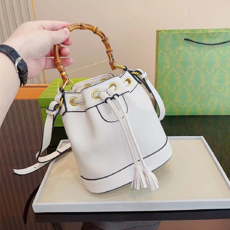 Mini Diana Bamboo Bags Totes designer bags crossbody shoulder tote bag woman handbags Luxury String Handbag Purses with Gold Letter 5A, Black(g l0g0)
Mini Diana Bamboo Bags Totes designer bags crossbody shoulder tote bag woman handbags Luxury String Handbag Purses with Gold Letter 5A, Black(g l0g0)