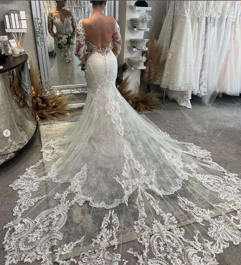 Backless Long Sleeve Mermaid Wedding Dresses 2023 Sheer neck Lace Floral Applique Fishtail Beach Garden Princess Bridal Gown