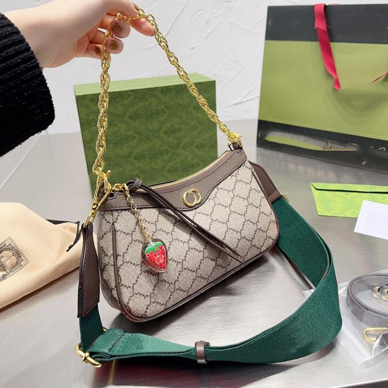 Women Hobos Bag Street Fashion Strawberry Letters Hobo Designer Crossbody Shoulder Bags Womens Handbags Baguette Saddle Gold Chain D2212162F, Brown
Women Hobos Bag Street Fashion Strawberry Letters Hobo Designer Crossbody Shoulder Bags Womens Handbags Baguette Saddle Gold Chain D2212162F, Brown