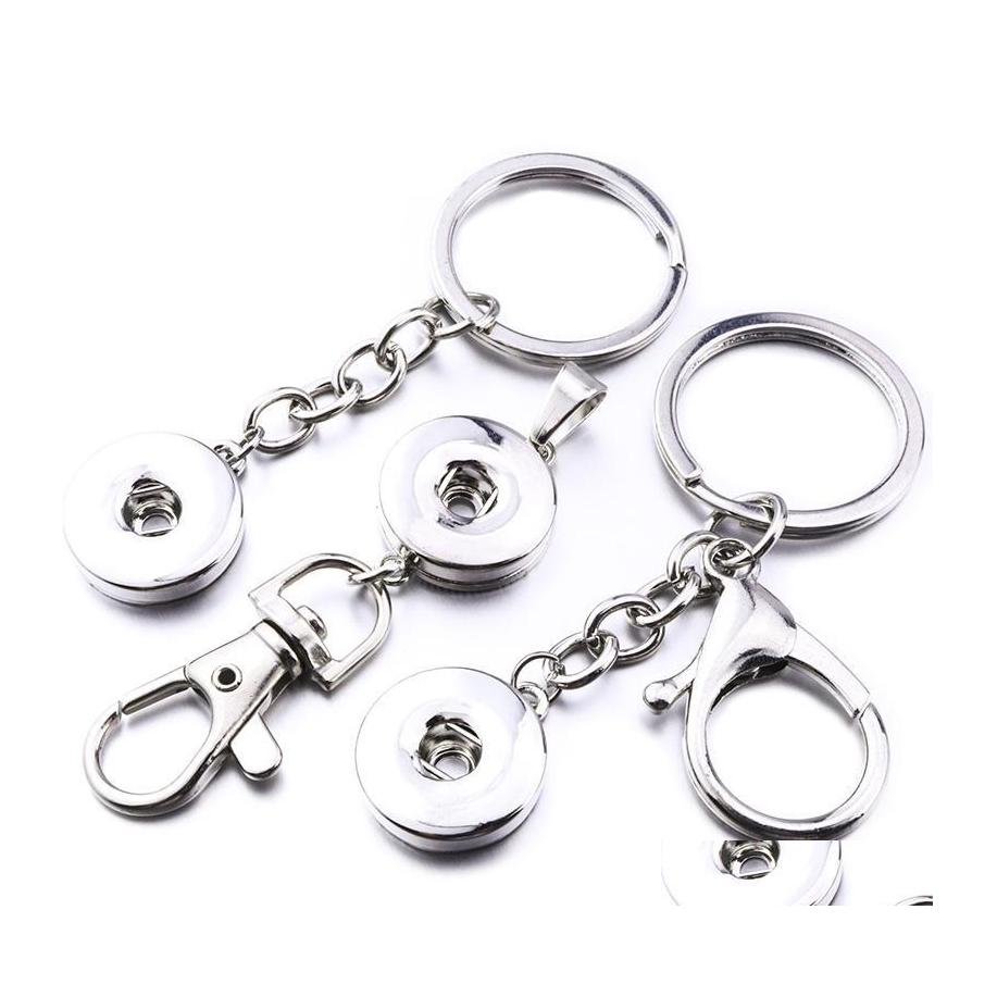 Key Rings Noosa Snap Button Jewelry 18Mm Buttons Chains Ring For Men Women Ginger Snaps Drop Delivery Dhyl4
Key Rings Noosa Snap Button Jewelry 18Mm Buttons Chains Ring For Men Women Ginger Snaps Drop Delivery Dhyl4