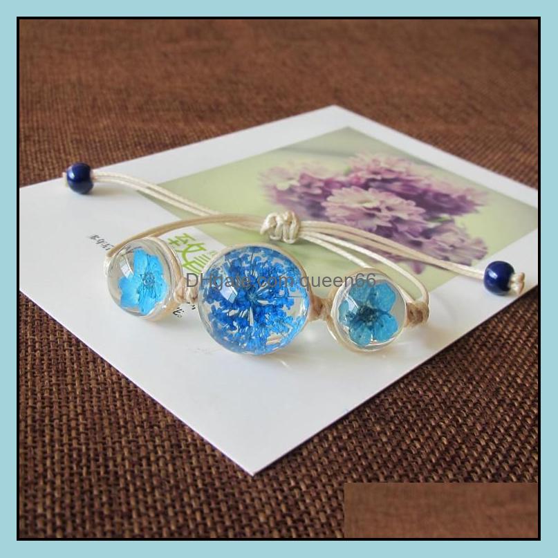 Beaded Strands Fashion Glass Ball Bracelet Weave Lucky Flower Bracelets Handmade Woven Dried Flowers Beads Women Jewelry Drop Deliver Ots9Y
Beaded Strands Fashion Glass Ball Bracelet Weave Lucky Flower Bracelets Handmade Woven Dried Flowers Beads Women Jewelry Drop Deliver Ots9Y
