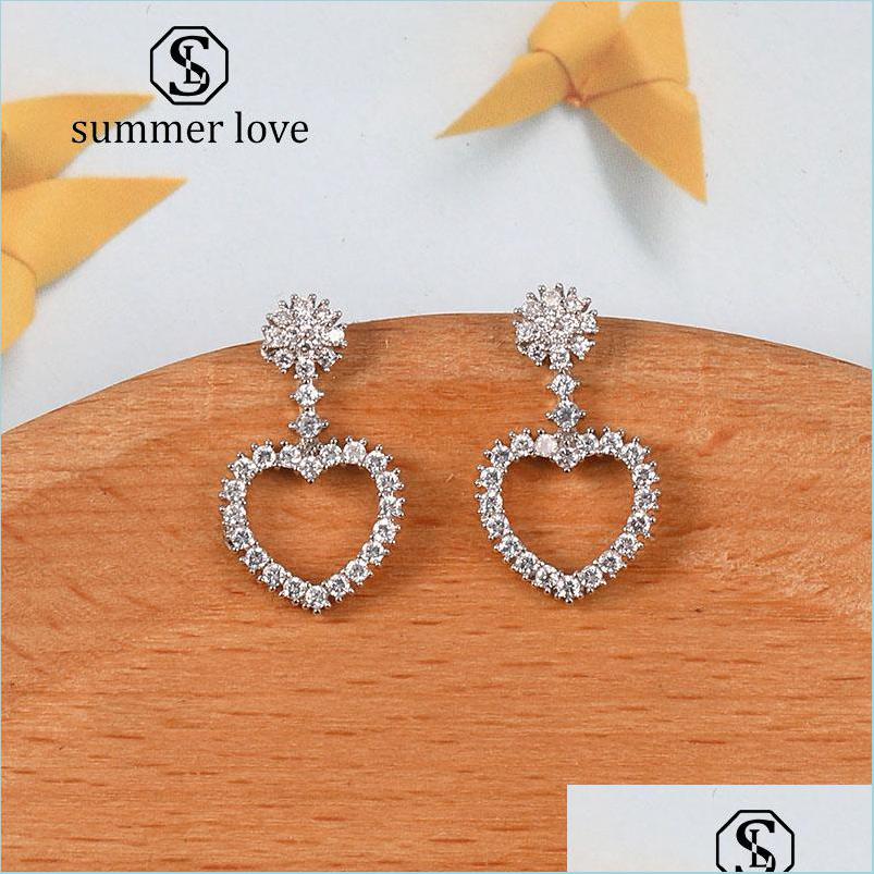 Dangle Chandelier New Hollow Heart Cubic Zirconia Earring For Women Girl Elegant Cz Micro Pave 925 Sier Pin Bride Wedding Party Je Dhr9U 
Dangle Chandelier New Hollow Heart Cubic Zirconia Earring For Women Girl Elegant Cz Micro Pave 925 Sier Pin Bride Wedding Party Je Dhr9U