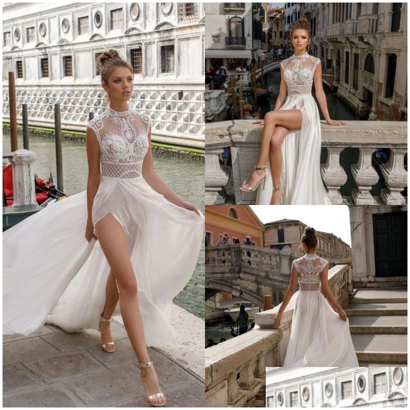 A-Line Wedding Dresses Sexy Lace Applique Illusion Spilt Gowns Plus Size High Neck Chiffon Dress For Drop Delivery Party Events Dholk, Silver
A-Line Wedding Dresses Sexy Lace Applique Illusion Spilt Gowns Plus Size High Neck Chiffon Dress For Drop Delivery Party Events Dholk, Silver