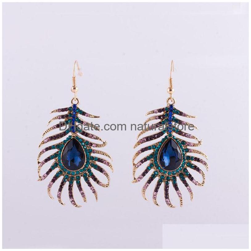Dangle Chandelier New Trendy Mticolor Rhinestone Peacock Feather Shape Gold Color Zinc Alloy Designer Drop Earrings Delivery Jewelr Dh12X
Dangle Chandelier New Trendy Mticolor Rhinestone Peacock Feather Shape Gold Color Zinc Alloy Designer Drop Earrings Delivery Jewelr Dh12X