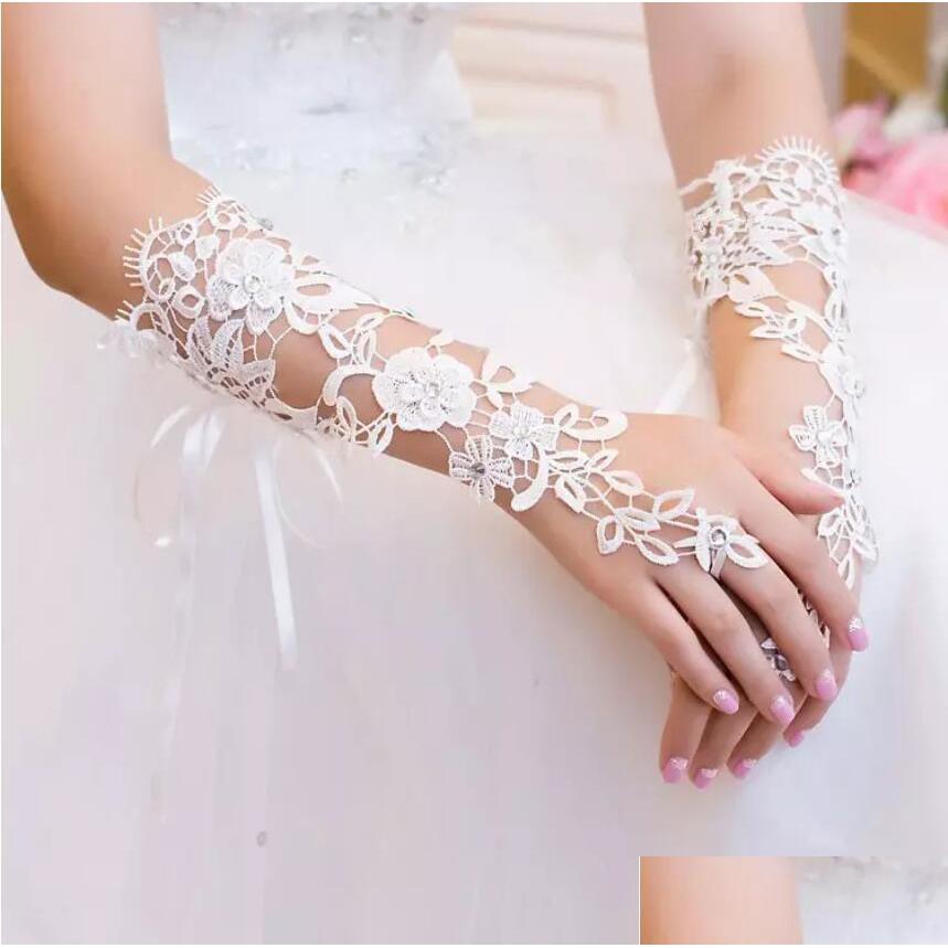 Bridal Gloves In Stock Lace Appliques Beads Ivory Or White Long Elbow Length Fingerless Elegant Wedding Crystals Drop Delivery Party Dhzdu
Bridal Gloves In Stock Lace Appliques Beads Ivory Or White Long Elbow Length Fingerless Elegant Wedding Crystals Drop Delivery Party Dhzdu