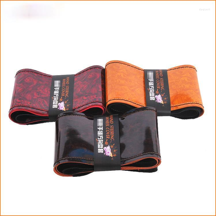Steering Wheel Covers Anti Slip Breathable Handle Cover Leather Splicing Peach Wood Grain Sports Hand Sewn Car
Steering Wheel Covers Anti Slip Breathable Handle Cover Leather Splicing Peach Wood Grain Sports Hand Sewn Car