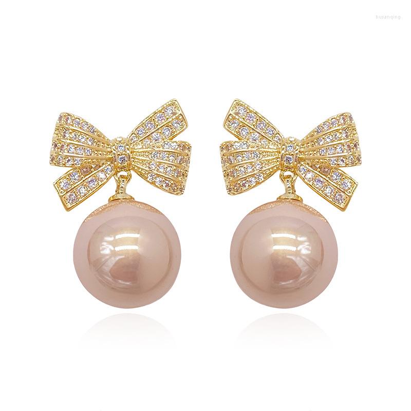 Dangle Earrings Temperament Pearl Bowknot Stud For Female Pendientes Mujer Korean Fashion Bead Luxury Jewelry With CZ
Dangle Earrings Temperament Pearl Bowknot Stud For Female Pendientes Mujer Korean Fashion Bead Luxury Jewelry With CZ
