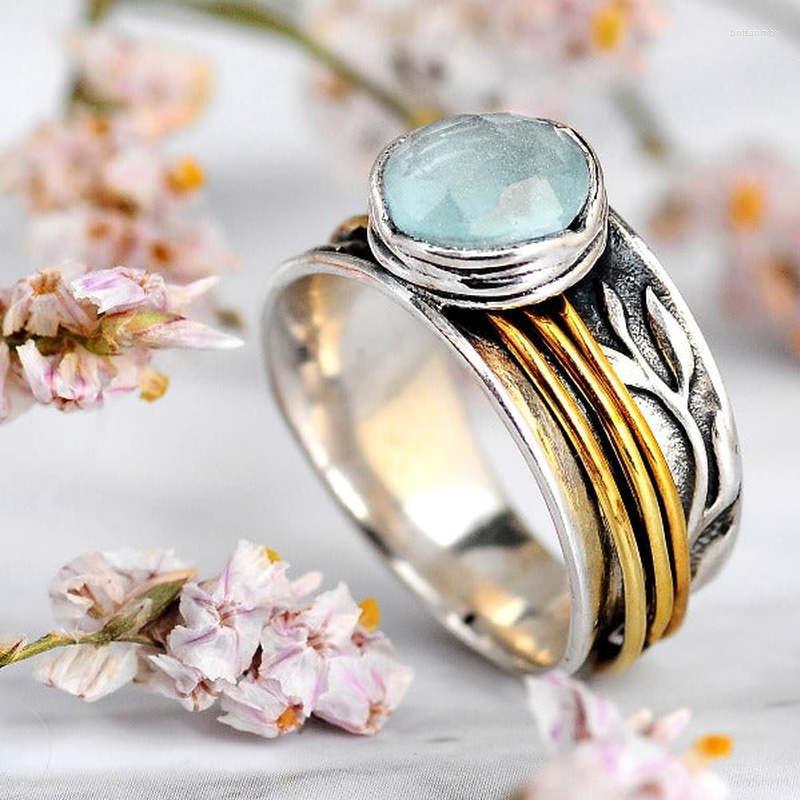 Cluster Rings Vintage Aquamarine Ring Two Tone Rotatable Decompression Natural Stone Moonstone Wide Thumb Boho Ladies
Cluster Rings Vintage Aquamarine Ring Two Tone Rotatable Decompression Natural Stone Moonstone Wide Thumb Boho Ladies