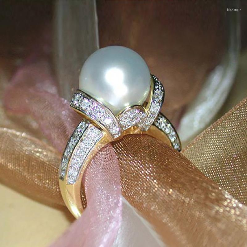 Wedding Rings Utimtree Luxury Gold Color Imitation Pearl For Women High Quality Cubic Zirconia Anniversary Party Ring Jewelry
Wedding Rings Utimtree Luxury Gold Color Imitation Pearl For Women High Quality Cubic Zirconia Anniversary Party Ring Jewelry