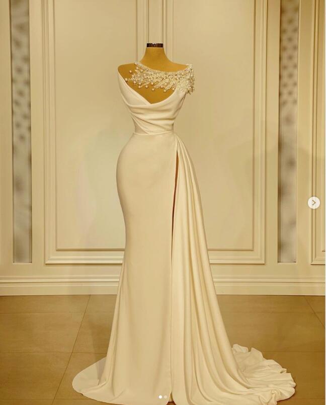 Ivory Stain Mermaid Prom Occasion Dresses 2023 Sexy Side Slit Sheer Pearls Neck Arabic Aso Ebi Princess Evening Gowns