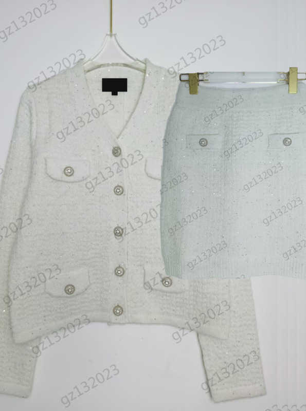 Womens Two Pieces Dress Custom Button Sequins Decoration Long Sleeves V-neck Cardigan High-waisted Slim Skirts Luxury Designer Women Clothes 1970, 17
Womens Two Pieces Dress Custom Button Sequins Decoration Long Sleeves V-neck Cardigan High-waisted Slim Skirts Luxury Designer Women Clothes 1970, 17