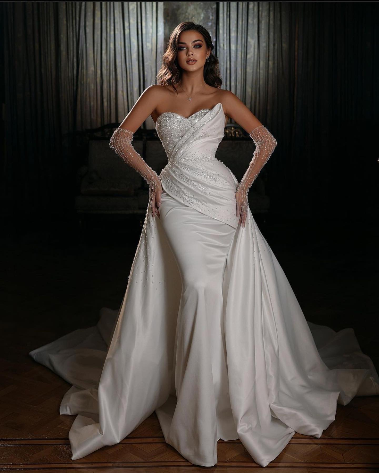 Sequined Mermaid Wedding Dress with Sweetheart Necke Long Sleeves and Beaded Detaig