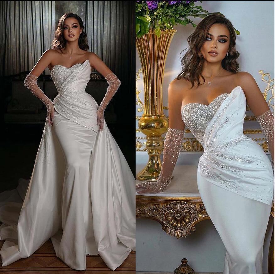 Sequined Mermaid Wedding Dress with Sweetheart Necke Long Sleeves and Beaded Detaig