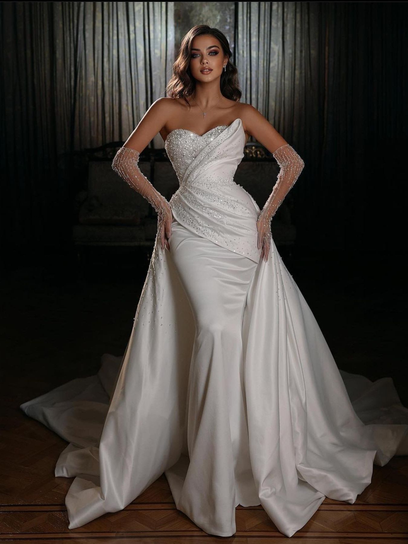 Sequined Mermaid Wedding Dress with Sweetheart Necke Long Sleeves and Beaded Detaig
