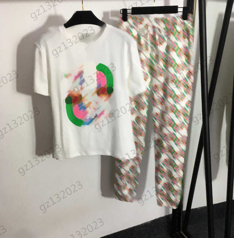 Two Piece Sets Womens Two Pieces Pants Chest Colorful Logo Print Crew Neck Short Sleeve Shirt Loose Ankle Banded Trousers Women Clothing 3 Colors 1970
Two Piece Sets Womens Two Pieces Pants Chest Colorful Logo Print Crew Neck Short Sleeve Shirt Loose Ankle Banded Trousers Women Clothing 3 Colors 1970