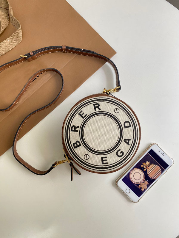 Classic round cake bag cloth leather luxury shoulder slung ladies bag European and American fashion trends, Brown
Classic round cake bag cloth leather luxury shoulder slung ladies bag European and American fashion trends, Brown