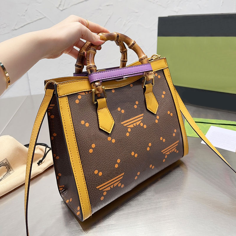 Bamboo Handbags Rivet Crossbody Tote Bag Women Shopping Bags Long Shoulder Strap Classic Letter Prints Cowhide Leather Handbag Large Capacity
Bamboo Handbags Rivet Crossbody Tote Bag Women Shopping Bags Long Shoulder Strap Classic Letter Prints Cowhide Leather Handbag Large Capacity