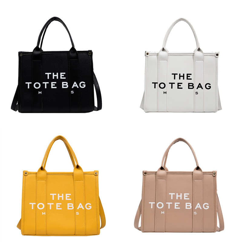 The Designer Tote Bags 2022 new fashion ladies tote shopping bag Marc handbag large capacity shoulder crossbody women PU leather canvas AJLS
The Designer Tote Bags 2022 new fashion ladies tote shopping bag Marc handbag large capacity shoulder crossbody women PU leather canvas AJLS