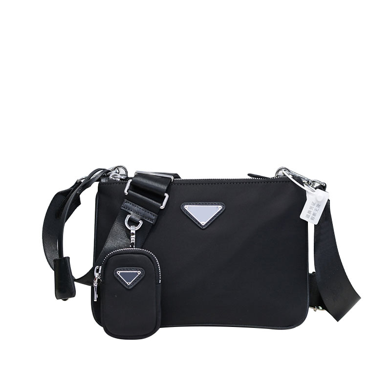Re-Edition Crossboy Bag Nylon Handbag Purse Removable Wide Strap Zip Pouch Zipper Closure Silver Hardware Triangle Sign Fashion Letters Plain Shoulder Bags
Re-Edition Crossboy Bag Nylon Handbag Purse Removable Wide Strap Zip Pouch Zipper Closure Silver Hardware Triangle Sign Fashion Letters Plain Shoulder Bags