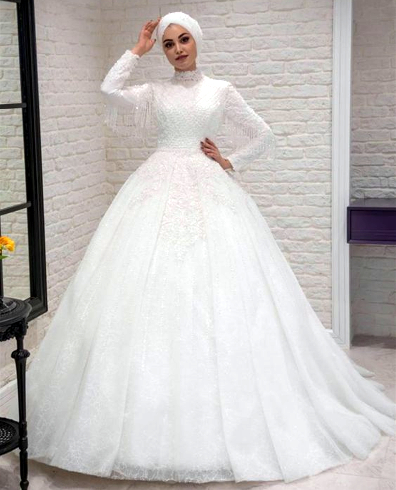 2023 Crystals Beaded Muslim A-Line Wedding Dresses Long Sleeves High Neck Lace Applique Beading Tassel Hijab Bridal Gowns Elegant Luxury Floor Length 