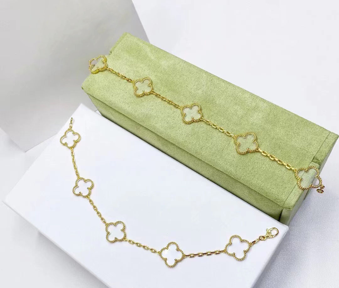 Bangle Luxury Clover Designer Bracelet Pearl 18k Gold Brand Love Charm Bracelets Shining Crystal Diamond a Party Jewelry6109382
Bangle Luxury Clover Designer Bracelet Pearl 18k Gold Brand Love Charm Bracelets Shining Crystal Diamond a Party Jewelry6109382