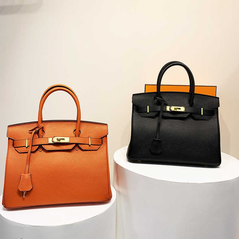 h bag Shoulder Birkins Designer bag H ermese Handbags 2022 new leather hand women litchi patterned head layer cow 30cm large capacity Single Messenger, Orange2
h bag Shoulder Birkins Designer bag H ermese Handbags 2022 new leather hand women litchi patterned head layer cow 30cm large capacity Single Messenger, Orange2