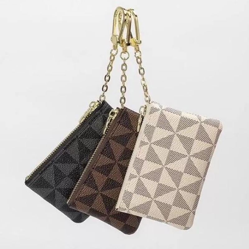 Quality Luxury design Coins Purse Card Holder Keys Pouch Portable KEY P0UCH wallet classic Man/women Coin Purse Chain bag With dust bags and gift box
Quality Luxury design Coins Purse Card Holder Keys Pouch Portable KEY P0UCH wallet classic Man/women Coin Purse Chain bag With dust bags and gift box