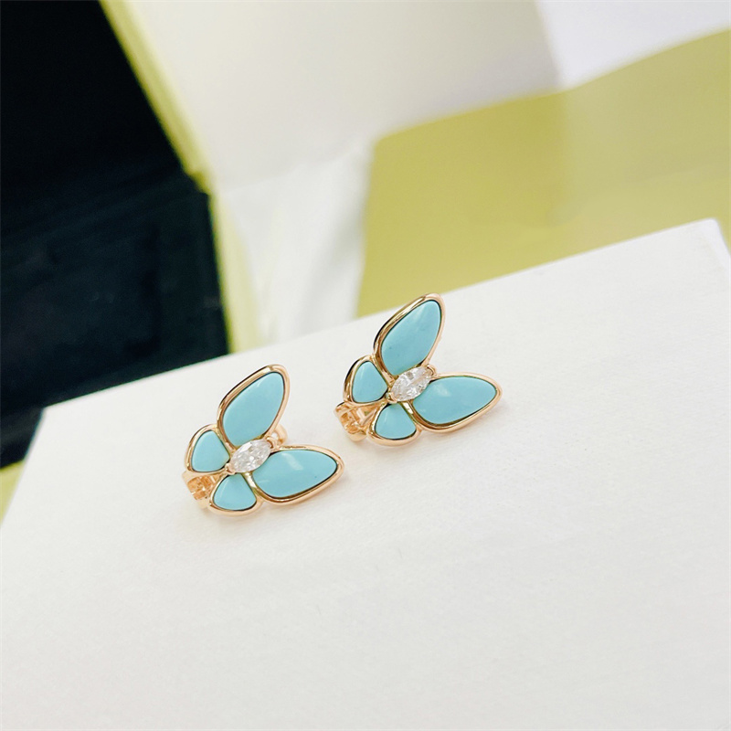 High Quality Necklaces Earrings Sets Designers Fashion Brand Luxurys Necklace Classic Letters Turquoise Golden Chains Butterfly Ear Rings
High Quality Necklaces Earrings Sets Designers Fashion Brand Luxurys Necklace Classic Letters Turquoise Golden Chains Butterfly Ear Rings