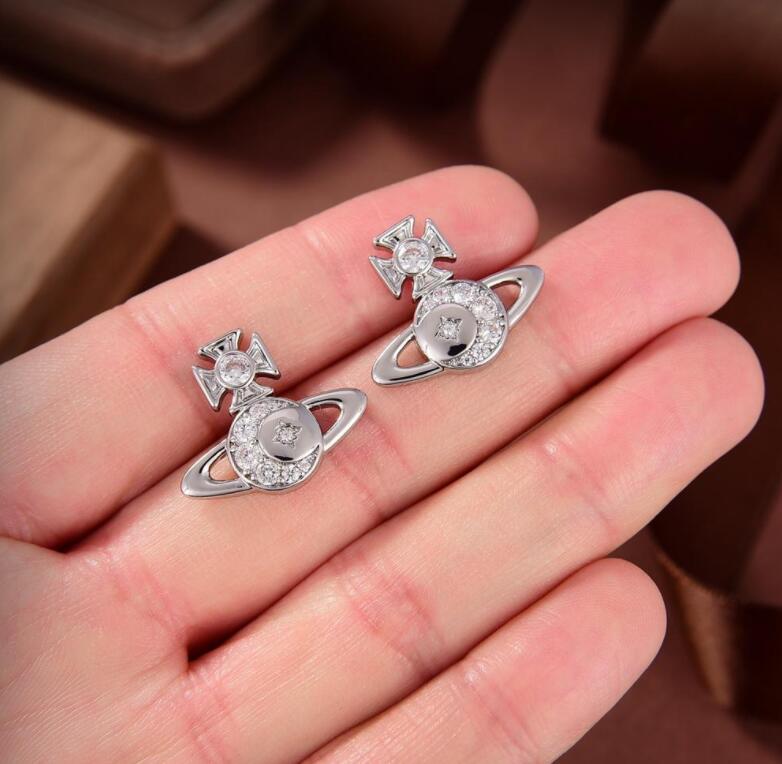 Classic Luxurious Earrings Stud Western Queen Planet star aura Luxury Jewelry Women inlays diamonds Saturn Earring Designer Jewelry
Classic Luxurious Earrings Stud Western Queen Planet star aura Luxury Jewelry Women inlays diamonds Saturn Earring Designer Jewelry