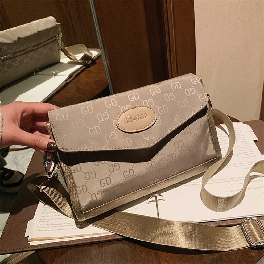 Luxury Designer Women's bag new messenger Oxford cloth versatile shoulder drying envelope hand women's, Khaki
Luxury Designer Women's bag new messenger Oxford cloth versatile shoulder drying envelope hand women's, Khaki