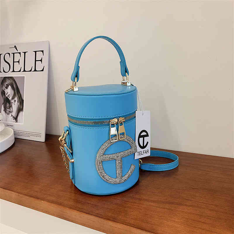 Crossbody bag new style in autumn T home portable bucket fashion high-grade texture diamond inlaid single shoulder cylinder, White
Crossbody bag new style in autumn T home portable bucket fashion high-grade texture diamond inlaid single shoulder cylinder, White