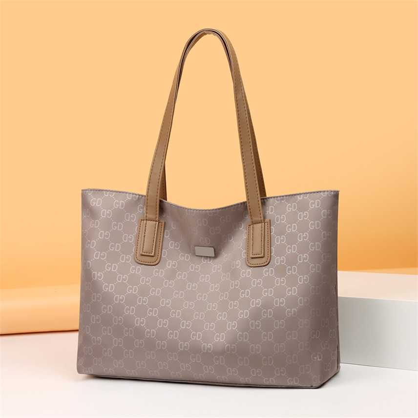 Luxury Designer Nylon Oxford printed women's bag large capacity tote simple shoulder leisure versatile hand, Style one 
Luxury Designer Nylon Oxford printed women's bag large capacity tote simple shoulder leisure versatile hand, Style one