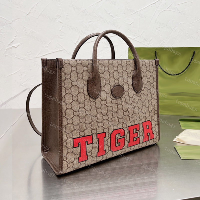 New Fashion Designer Totes Bag Women Casual Onthego Shopping Bags Tiger Letter Mom Luxury Handbag Classic Shoulder bags, 2 other items bags
New Fashion Designer Totes Bag Women Casual Onthego Shopping Bags Tiger Letter Mom Luxury Handbag Classic Shoulder bags, 2 other items bags