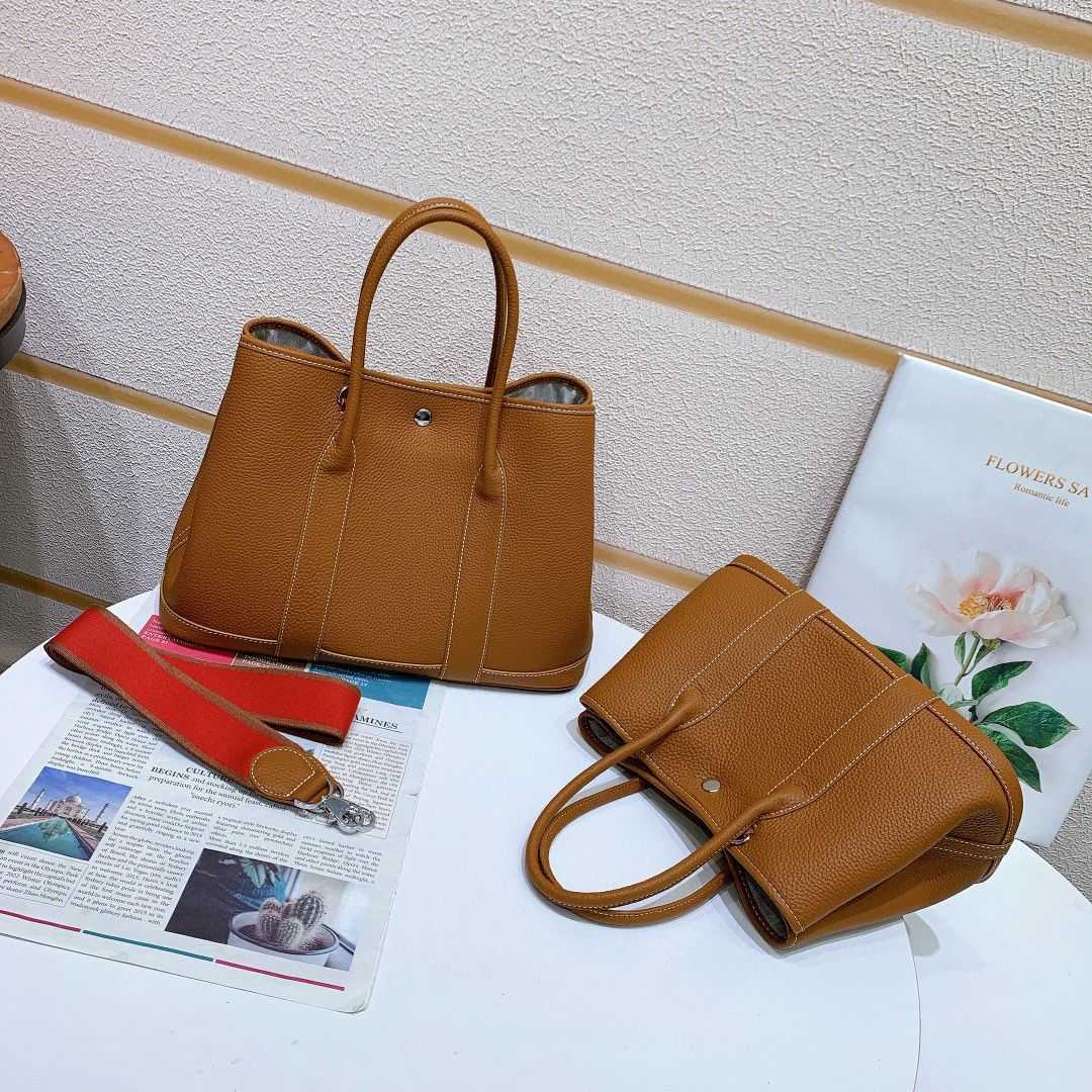 h bag Designer leather H ermese garden bag 2022 New Fashion Genuine Leather Garden Large Capacity Bucket One Shoulder Portable Tote Bridal Wedding Commuter, Sky blue
h bag Designer leather H ermese garden bag 2022 New Fashion Genuine Leather Garden Large Capacity Bucket One Shoulder Portable Tote Bridal Wedding Commuter, Sky blue
