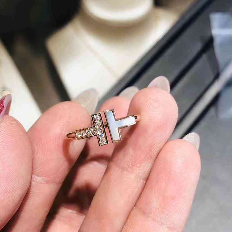 Luxurious double t ring with diamond fritillaria 18k rose gold ins net red star the same temperament and versatile sterling silver
Luxurious double t ring with diamond fritillaria 18k rose gold ins net red star the same temperament and versatile sterling silver