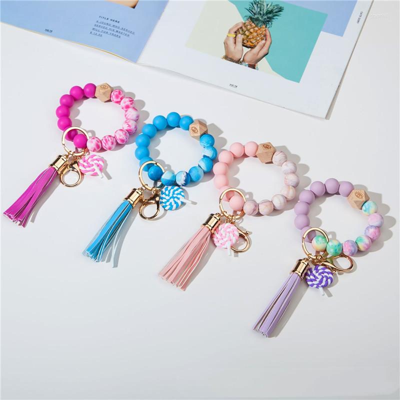 Keychains Colorful Lollipop Silicone Beads Charm Bracelet Keychain Wristlet Leather Tassel Key Ring For Women Jewelry Gifts
Keychains Colorful Lollipop Silicone Beads Charm Bracelet Keychain Wristlet Leather Tassel Key Ring For Women Jewelry Gifts
