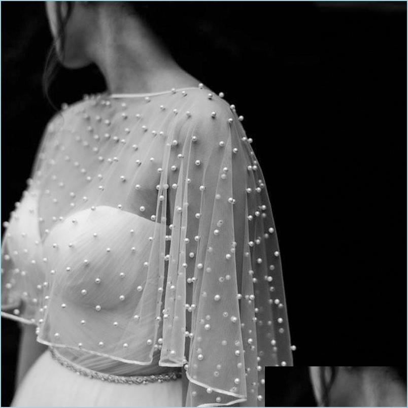 Wraps Jackets Wedding Accessories Bolero Bridal Cloak Pearls Cape Short Front Long Back Women Wrap Evening Shawls Drop Delivery Pa Dhrxp, White
Wraps Jackets Wedding Accessories Bolero Bridal Cloak Pearls Cape Short Front Long Back Women Wrap Evening Shawls Drop Delivery Pa Dhrxp, White